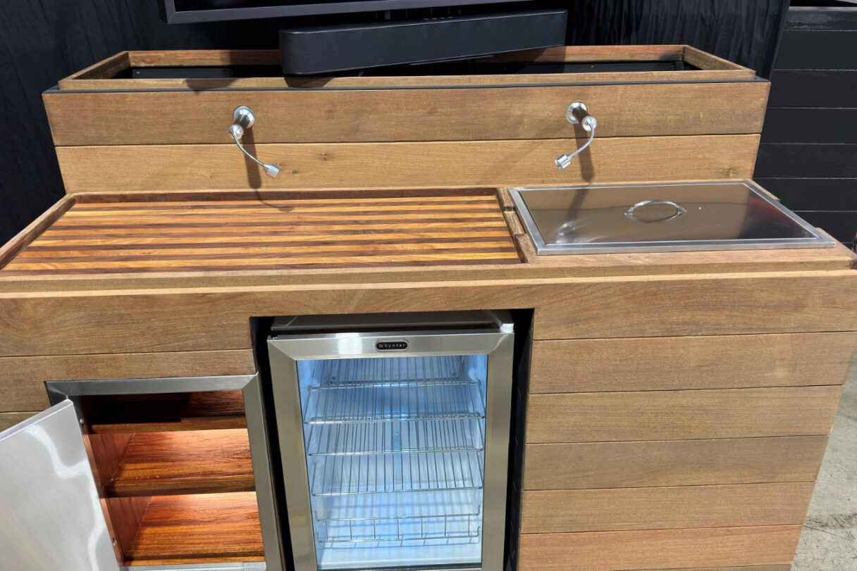 front close up of mini stunner tv lift cabinet outdoor bar