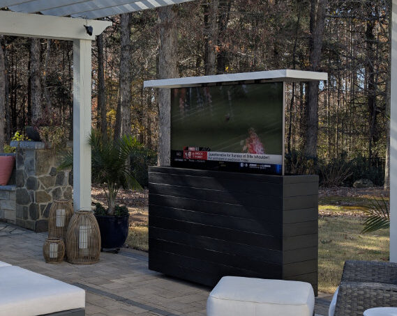 hidden tv inside weather ready lift furniture cabinet outside featured